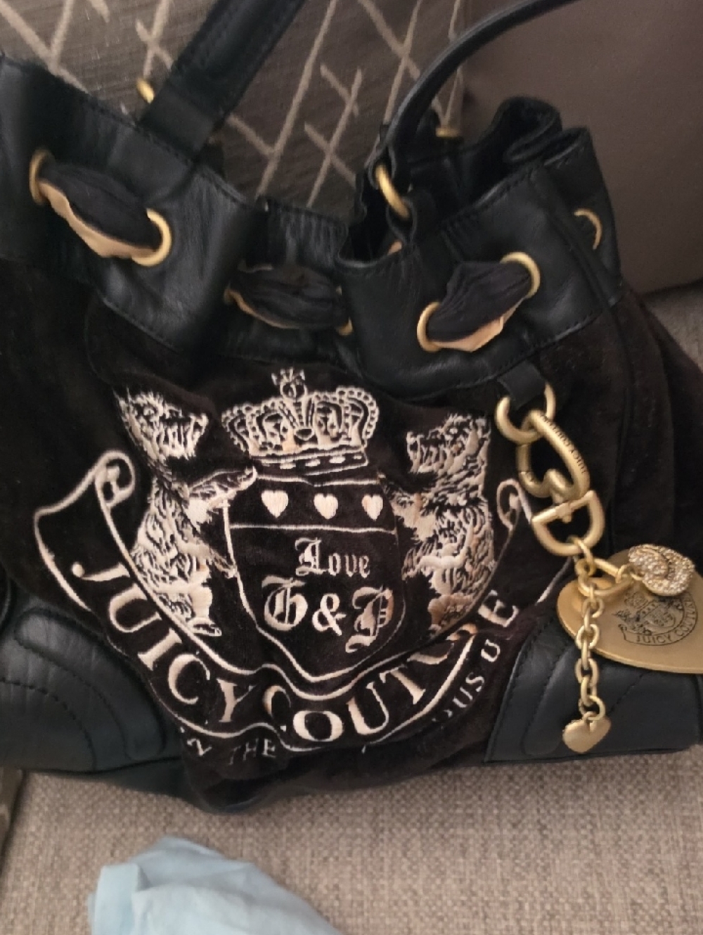 Juicy Couture Black and Gold Shoulder Bag with Crest Logo